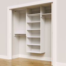 White 76.5-inch Vista Total Closet Kit, angled view, empty, with tall hanging in a reach-in closet