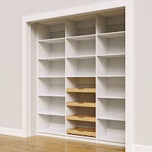 Four sliding wood drawers in a 78 inch white kitchen pantry.