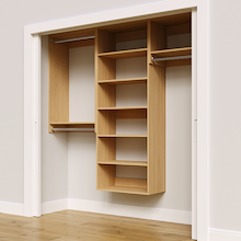 Natural oak 79.5-inch woodgrain Vista Total Closet Kit, angled view, empty, with tall hanging in a reach-in closet