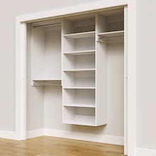 White 79.5-inch Vista Total Closet Kit, angled view, empty, with tall hanging in a reach-in closet