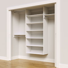 White 82.5-inch Vista Total Closet Kit, angled view, empty, with tall hanging in a reach-in closet