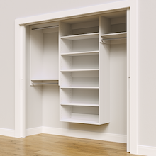 White 85.5-inch Vista Total Closet Kit, angled view, empty, with tall hanging in a reach-in closet