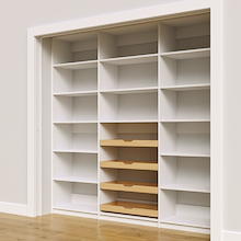 Adjustable shelf details and four wood drawers on 87 inch white pantry.
