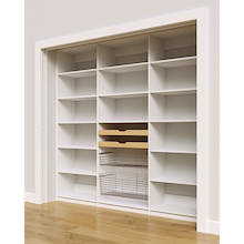 Large white 90 inch pantry organization with mixed wood drawer and pull-out wire basket sections.
