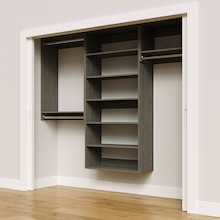 Grey 91.5-inch woodgrain Vista Total Closet Kit, angled view, empty, with tall hanging in a reach-in closet