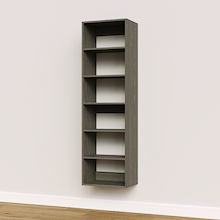 Grey 19.5 inch shelf tower for space-saving storage in a studio apartment.