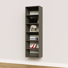 Grey 19.5 inch closet organizer for shirts in a guest bedroom.