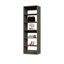 Grey 21 inch vertical closet shelving for folded jeans and sweaters.