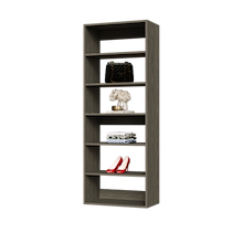 Grey 25.5 inch wardrobe shelf tower for structured clothing storage in a contemporary bedroom.