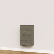 Grey built-in closet drawer cabinet with slab fronts for custom wardrobe storage.