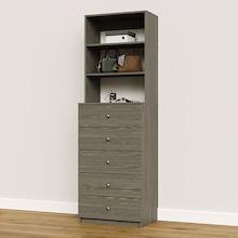 Grey built-in closet drawer chest with slab fronts for custom wardrobe storage.