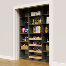 Modern grey 63 inch reach in pantry with four wood pull-out drawers.
