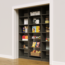 66 inch vertical pantry racks in grey with three chrome wire baskets.
