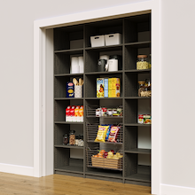 69 inch grey reach in pantry racks with three wire baskets for jars and cans.