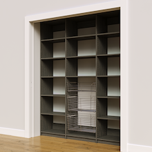 Wide view of a 72 inch grey pantry storage with three wire baskets.