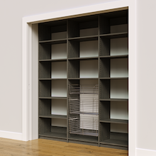 Three wire baskets in a 78 inch grey kitchen pantry shelving.