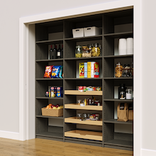 Sturdy 84 inch grey reach in pantry shelves with four wood pull-out drawers.