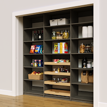87 inch grey pantry shelving layout with four sliding wood drawers.