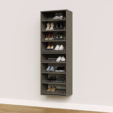 Grey shoe organizer with 8 slanted shelves for vertical storage in small closets.