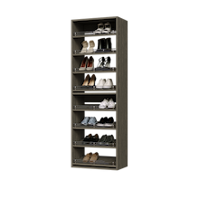 Grey shoe tower with 8 slanted shelves for high heels in a bedroom closet.