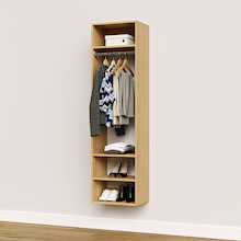 Natural oak hanging closet tower module with an upper shelf, hanging rod, and three lower shelves for linen storage.