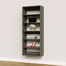 Grey 27 inch shelf tower for bulky sweaters and blankets in a walk-in closet.