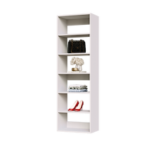 White 21 inch shelf tower for toys and clothes in a kids' room.