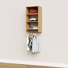 Natural oak medium hanging closet module with linens on three upper shelves and clothing on a hanging rod below.