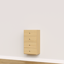 Natural oak built-in closet drawer cabinet with slab fronts for folded clothing and wardrobe storage.