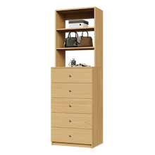 Natural oak drawer unit with slab fronts for large closet storage.