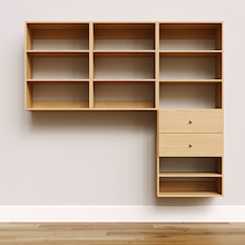 Natural Oak Choice Laundry Kit with a shelf tower with two drawers and overhead shelving providing built-in laundry room storage.