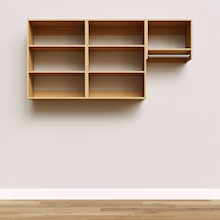 Natural Oak Classic Laundry Kit with a clothes hanging rod and overhead shelving providing built-in laundry room storage.