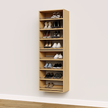 Natural oak shoe organizer with 8 slanted shelves for custom walk-in closets.