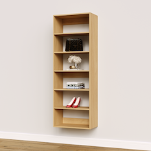 Natural oak 24 inch shelf tower for bags and shoes in an entryway.
