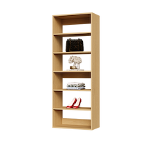 Natural oak 25.5 inch closet shelving for folded pants and shirts.