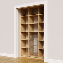Three pull-out wire baskets in a 54 inch natural oak pantry for dry goods storage.