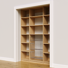 Three pull-out wire baskets in a 60 inch natural oak pantry rack.