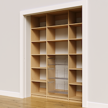 Close up of three wire pull-out baskets in a 66 inch natural oak pantry.
