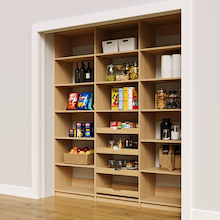 78 inch natural oak reach in pantry featuring four wood pull-out drawers for cans and jar storage.