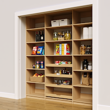 Vertical pantry shelves in natural oak with 81 inch width and four wood pull-out drawers.