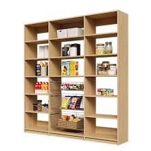 Large 81 inch natural oak pantry shelving with three wire baskets for storage.