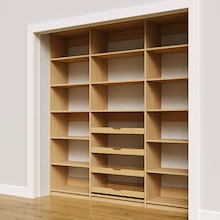 84 inch natural oak pantry shelving with four wood drawers.