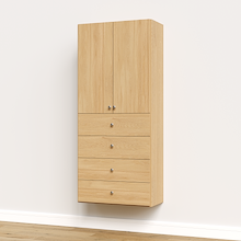 Natural oak half closet doors 31.5 inch slab covering adjustable shelves in a large reach-in closet tower.