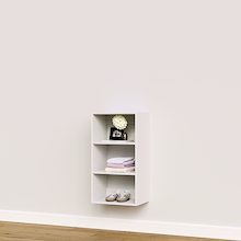 White closet shelf unit for shoes, handbags, and accessory storage.