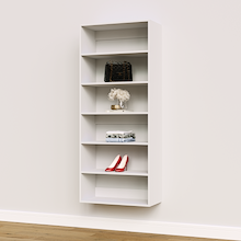 White 28.5 inch walk-in wardrobe shelf tower in a master bedroom.