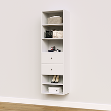 White slab 2-drawer closet shelf tower module designed with five open shelves and two deep drawers for folded sweaters and jeans storage.