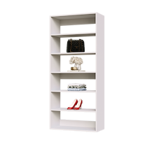 White 30 inch shelf tower for extra-wide storage in a walk-in closet.