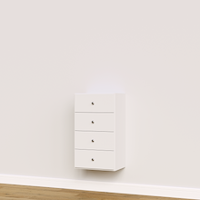 White built-in closet drawers with slab fronts for folded clothing and accessory storage.