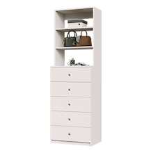 White closet drawer cabinet with slab fronts and top surface for jewelry or accessory display.