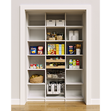 Adjustable 54 inch white pantry shelves with two wood pull-out drawers and two pull-out wire baskets.
